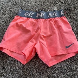 NIKE PROS womens size MEDIUM fluorescent orange grey strip shorts